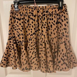 New with tags leopard print skirt with shorts under!